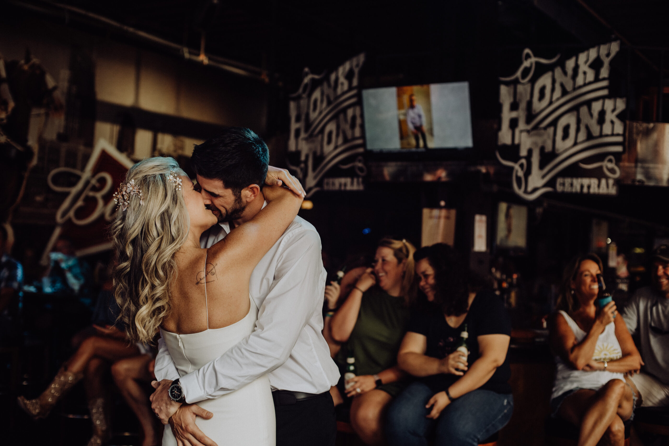 bride a groom dancing in a honky tonk in nashville tn on their wedding day