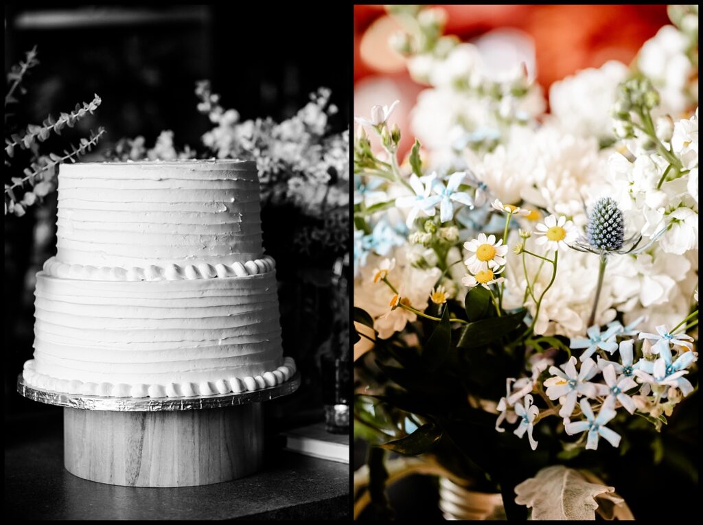 A two-tiered white frosted cake on a wooden stand sits beside a bouquet of white, yellow, and light blue flowers with greenery—perfect for Jess and Chris’s celebration.
