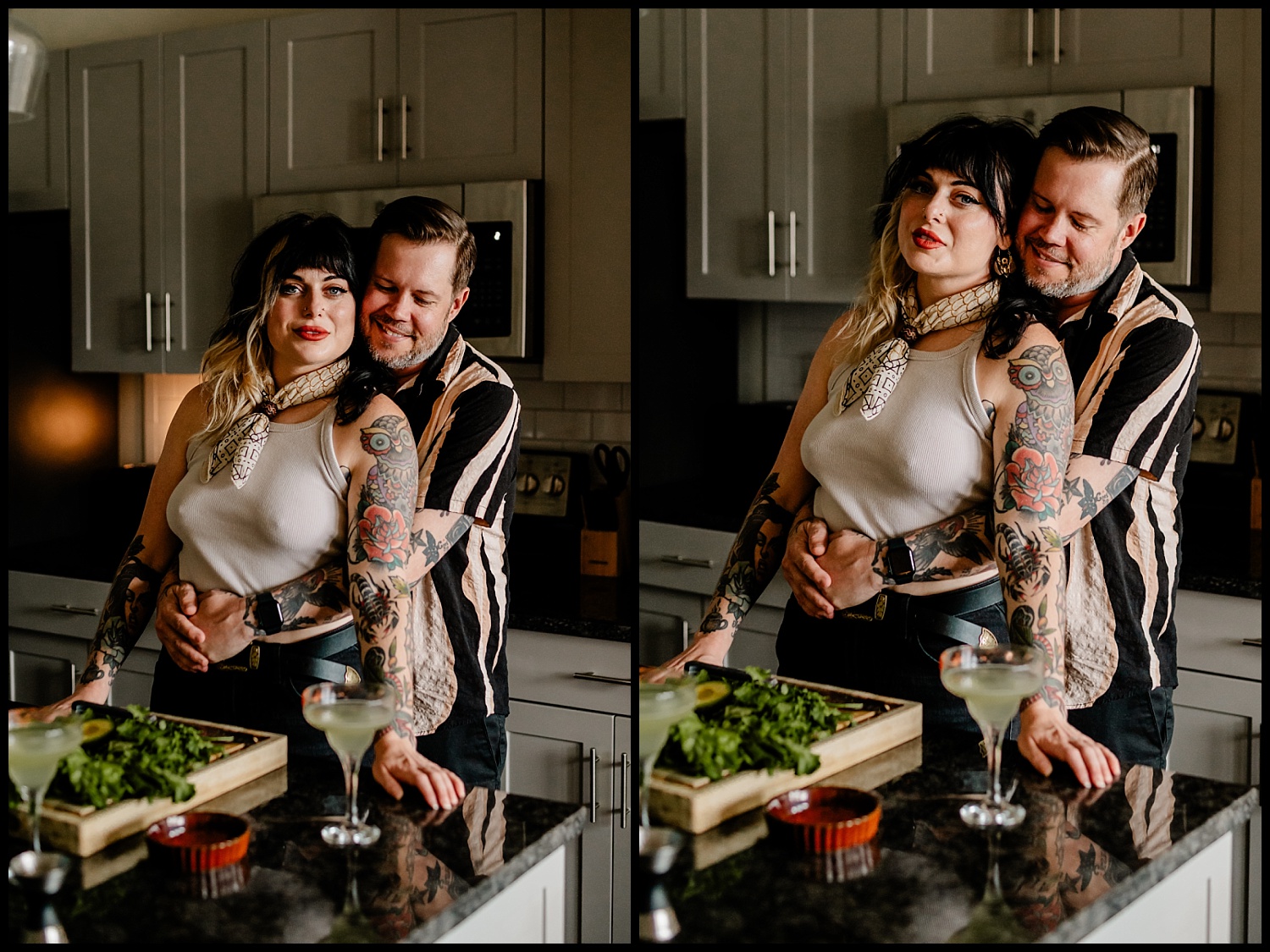 A couple stands in their modern Nashville kitchen during an in-home couples session, embracing and smiling. The tattooed woman stands in front while the man hugs her from behind. A cocktail and a cutting board with greens sit on the counter.