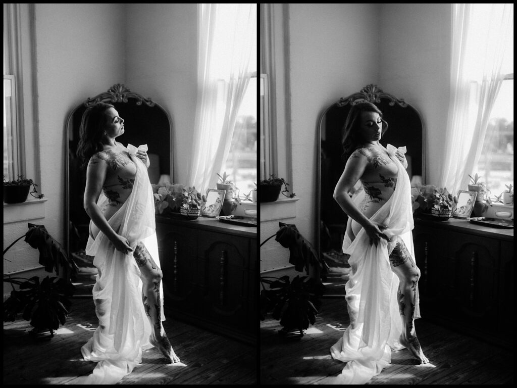 A black and white diptych photo of a woman with tattoos, draped in sheer white fabric, posing confidently by a window in a sunlit Nashville Boudoir studio, with a vanity table and potted plants.
