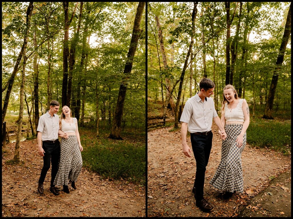 A couple walks hand in hand through a sunlit forest during golden hour, both smiling and laughing in casual, vintage-inspired clothing. The warm atmosphere creates the perfect backdrop for their romantic session.