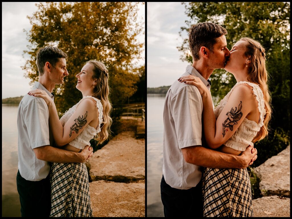 A couple stands by a lake at sunset during their Nashville engagement session, smiling and embracing in the first image, then sharing a kiss in the second. Trees and water create a peaceful, natural background illuminated by golden hour light.