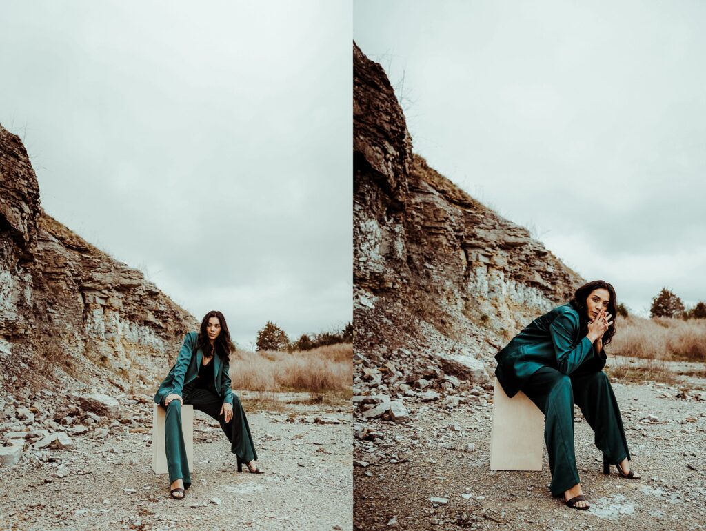 A woman in a teal suit poses in a rocky outdoor landscape, captured by a Nashville creative portrait photographer. In the left image, she sits on a chair; in the right, she leans forward on a cube amid cloudy, rugged scenery.