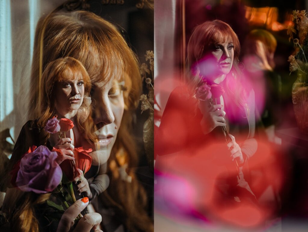 A woman with long red hair holds roses; the image, by a Nashville creative portrait photographer, is artistically double-exposed, blending her thoughtful expression with blurred floral elements. Warm light enhances the dreamy, ethereal atmosphere.