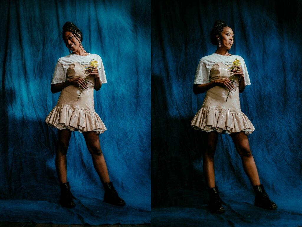 A woman in a light-colored ruffled dress and black boots poses in front of a blue fabric backdrop, holding a yellow rose and smiling. Captured by a Nashville creative portrait photographer, the image shows two distinct poses side by side.