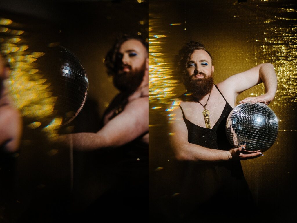 A person with a beard, curly hair, blue eye makeup, and a black dress poses with a disco ball against a shimmering gold background—captured in two similar portraits side by side by a Nashville creative portrait photographer.